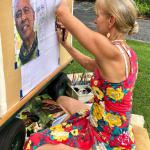 Calley immersed herself in interviews and research with and through each of the kupuna who are guiding the content and purpose of the mural.  Here she is in process of drawing Uncle Earl Regidor.