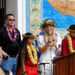 Calley introduces key players in the making of the mural - models Hiapo and Ku'upio, and CSL Construction representatives who were crucial in the installation of the mural. 